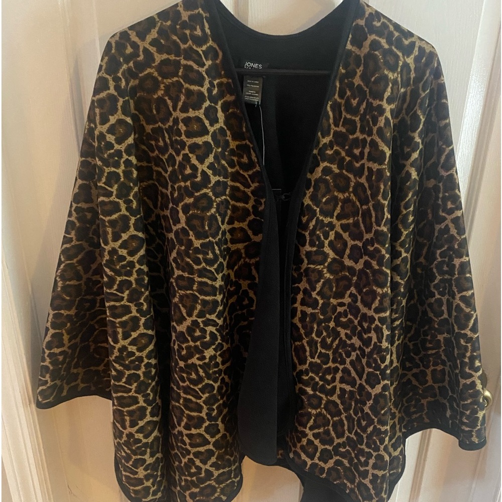 Signature-One Size,leopard cape,black felt lining and arm holes.